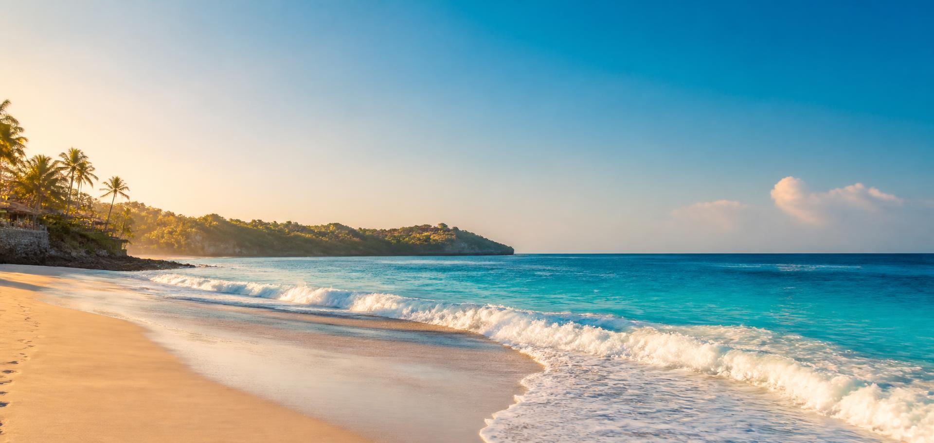 Turquoise sea and white sand beach in Bali